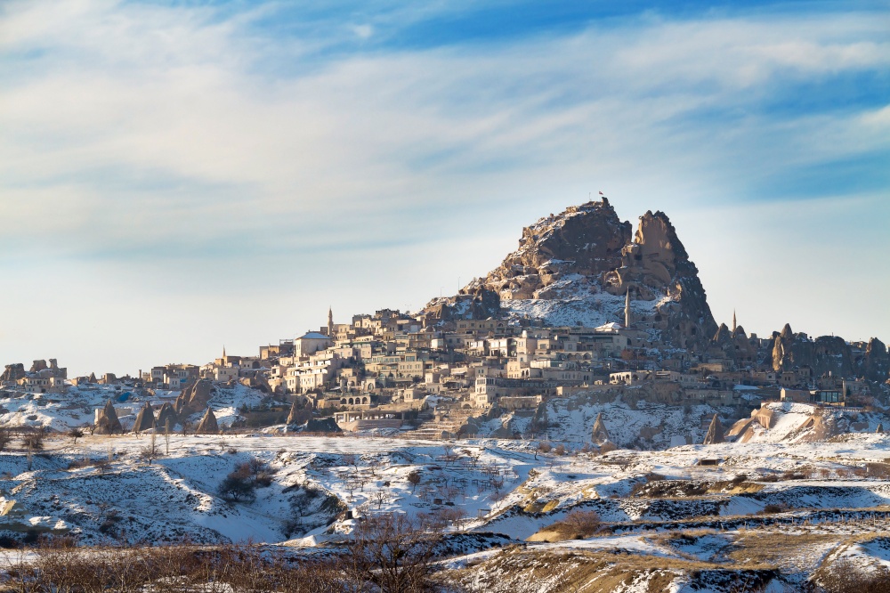 Uchisar Castle in winter, Cappadocia, Goreme, Turkey.. Uchisar Castle in winter.