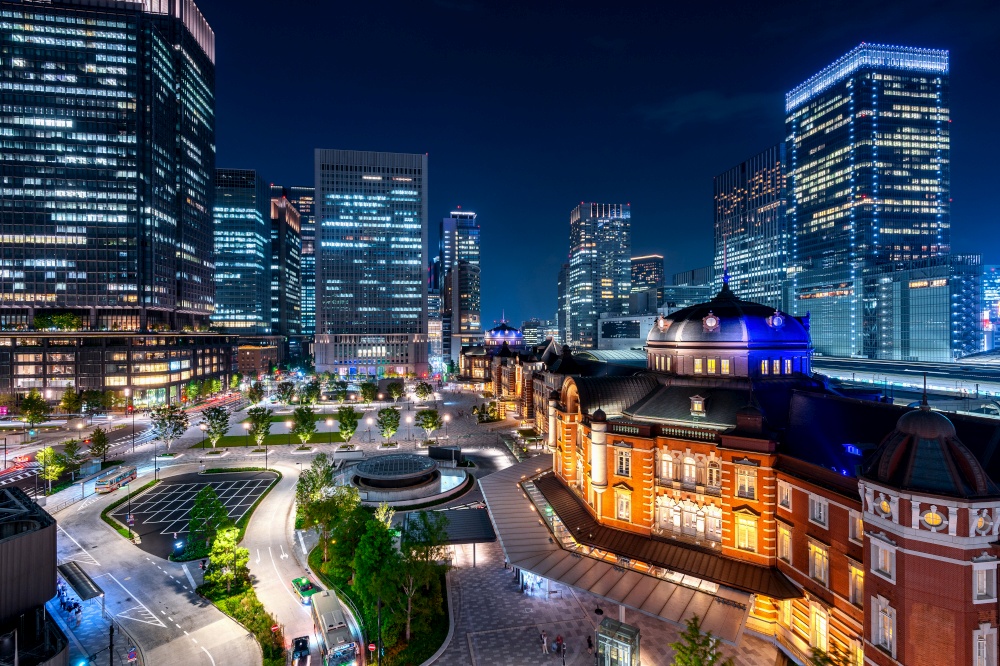 Tokyo railway station and business district building at night, Japan.