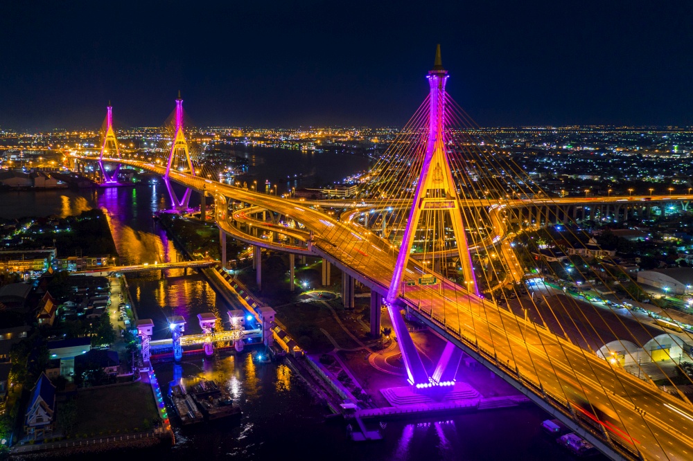 Aerial view of Industry Ring Suspending bridge at night in Bangkok, Thailand.
