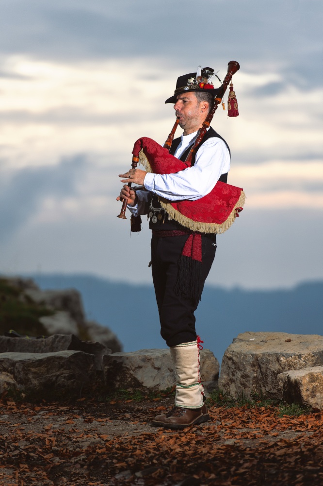 Bergamo Bagpipe. Player with traditional costume.