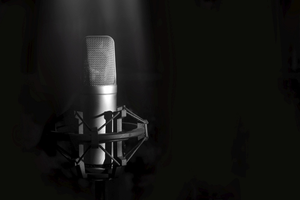 Studio microphone for singer on a black background.. Studio microphone for singer on a black background