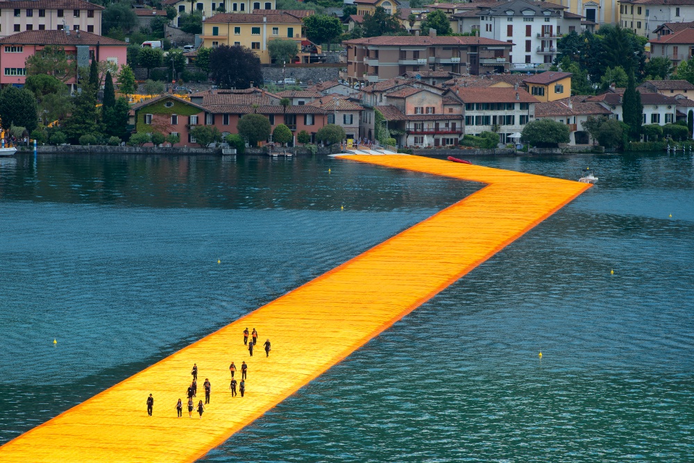 Peschiera Maraglio, Italy - June 17, 2016: The floating piers. The artist Christo walkway on Lake Iseo. First accredited photographers in the day before the opening