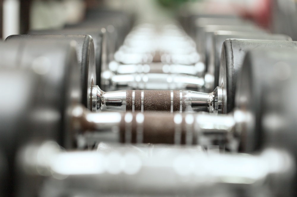 Dumbbells in gym ready for workout,Selective focus