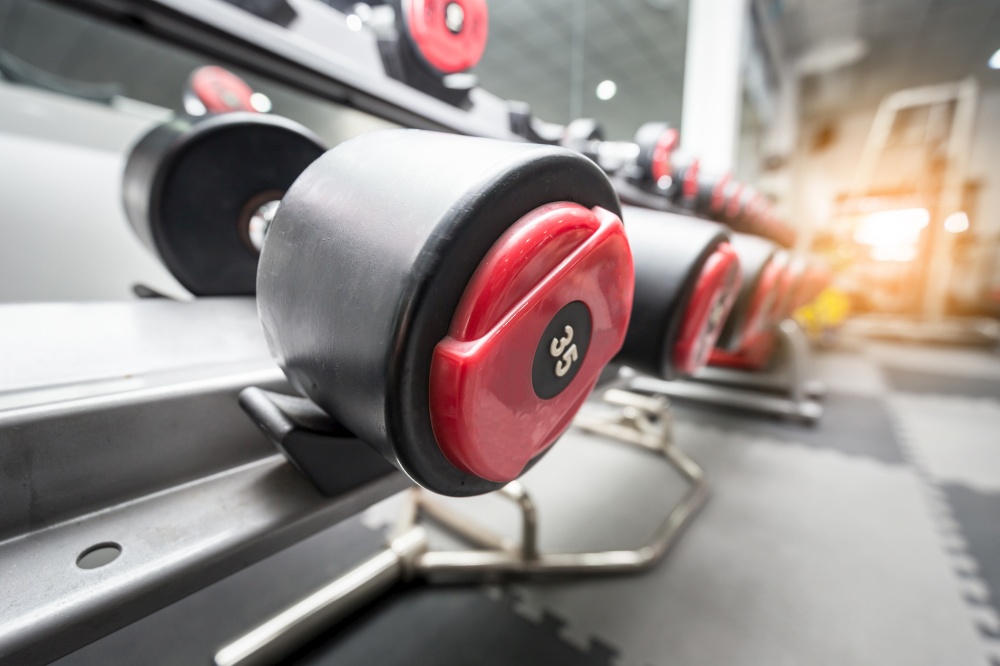 Dumbbells in gym ready for workout,Selective focus