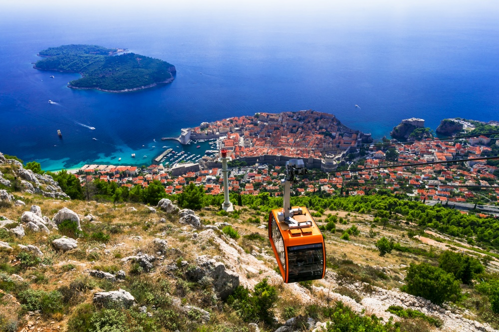 Dubrovnik town - pearl of Adriatic coast. Aerial view of cable car ,old town and island nearby. Croatia. Landmarks of Croatia. Dubrovnik, cable car