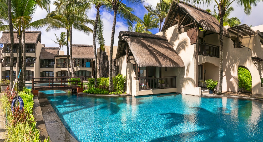 luxury 5 star resort territory with swimming pool and hotel rooms and villas - Constance Belle Mare Plage. Mauritius island. Pointe de flacq , Belle Mare. February 2020. Mauritius island holidays. Exotic hotel with beautiful territory