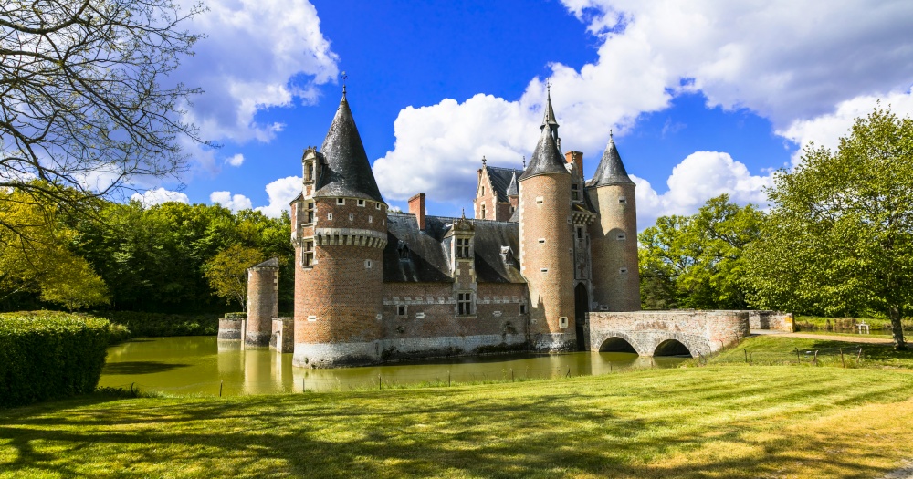 Romantic medieval castles of Loire valley. France. Chateau du Moulin. Picturesque well preserved castle Moulin in famous Loire valley