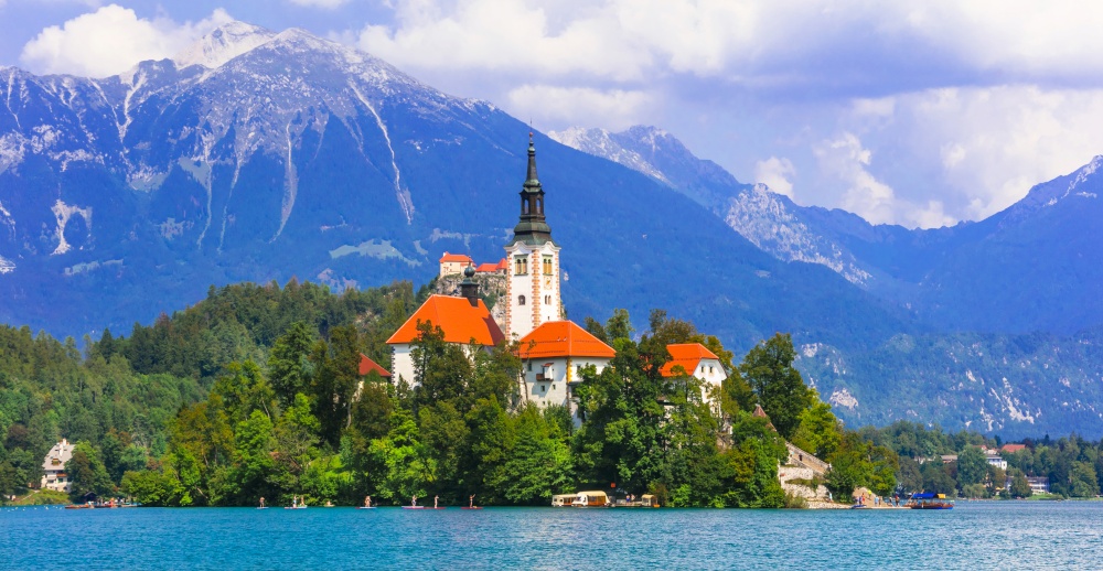 Iconic view of stunning lake Bled with small island and the church. Nature of  Slovenia