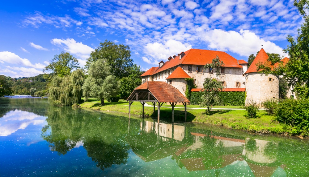 Beautiful romantic castle on the island medieval Grad Otocec in Krka river, Slovenia