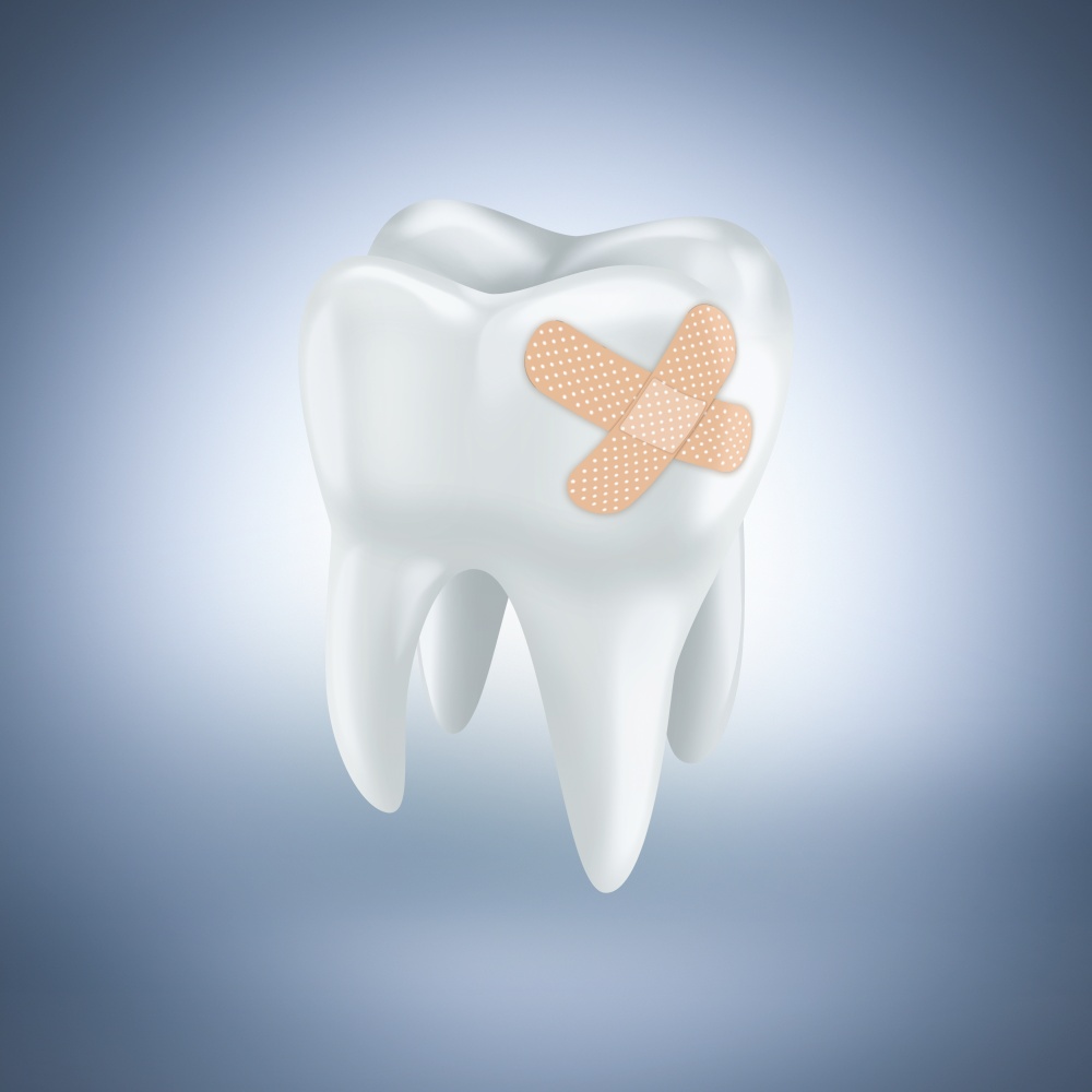 Tooth with plaster on light blue background