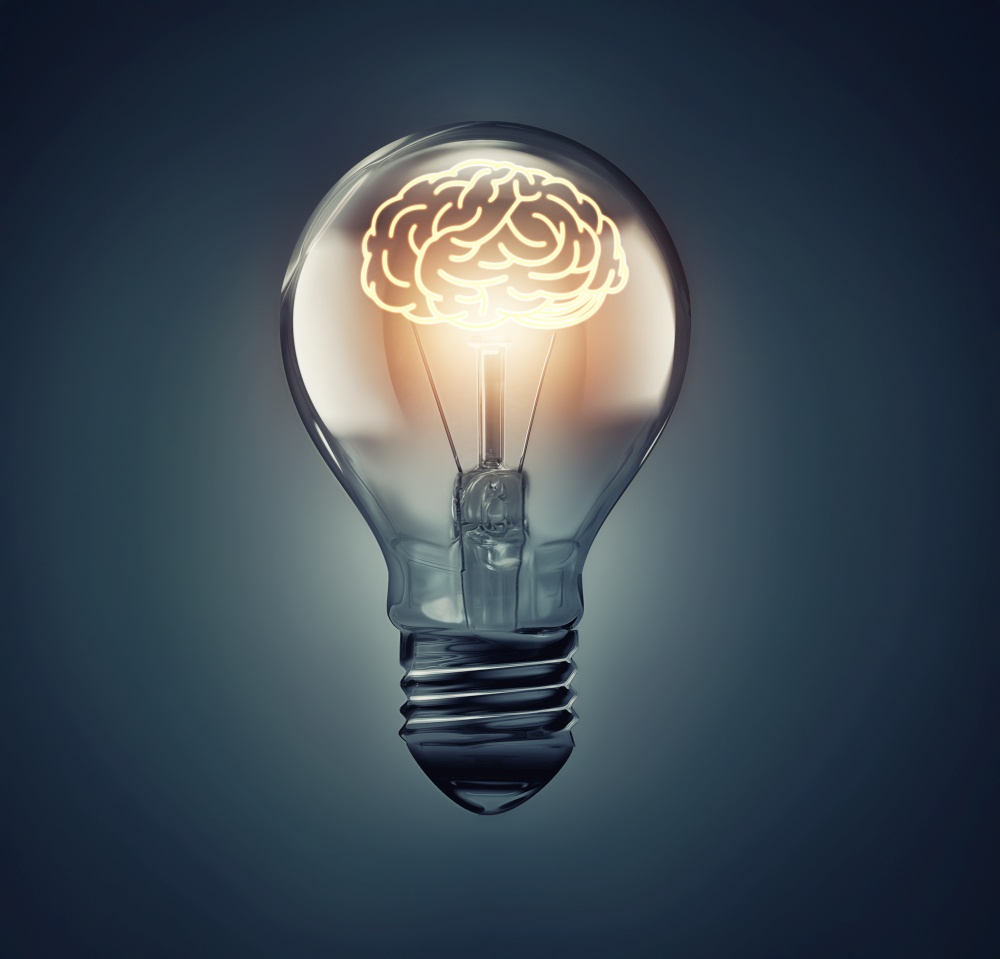 glowing brain inside the bulb, idea concept image