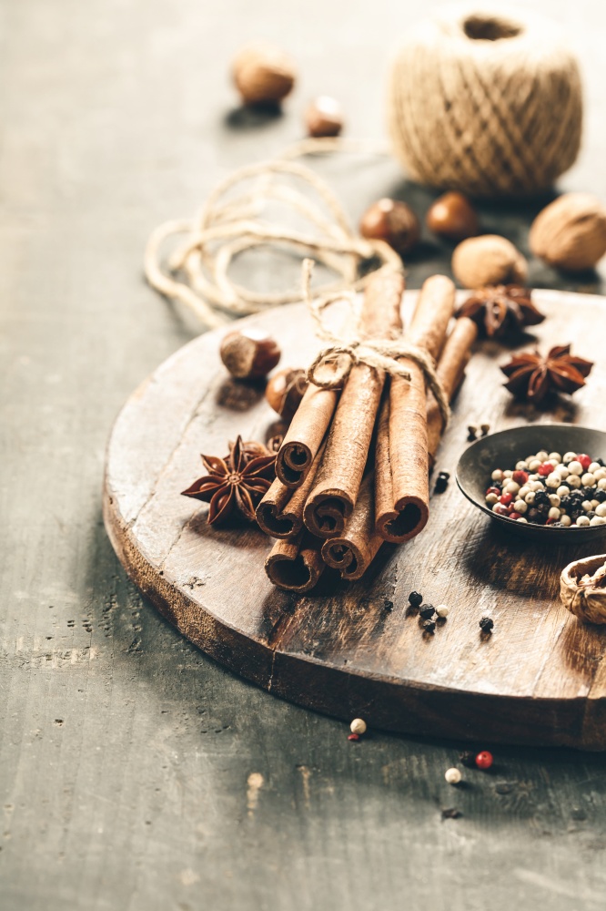 spices, autumn or winter cooking concept apple pie, cider, vinegar or mulled wine, wooden background. spices, autumn or winter cooking concept apple pie, cider, vinegar or mulled wine