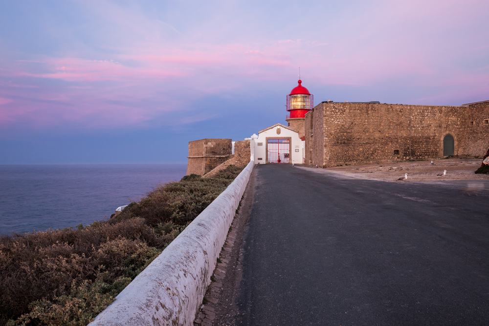 View of the lighthouse and cliffs at Cape St. Vincent at sunset. Continental Europe&rsquo;s most South-western point, Sagres, Algarve, Portugal.