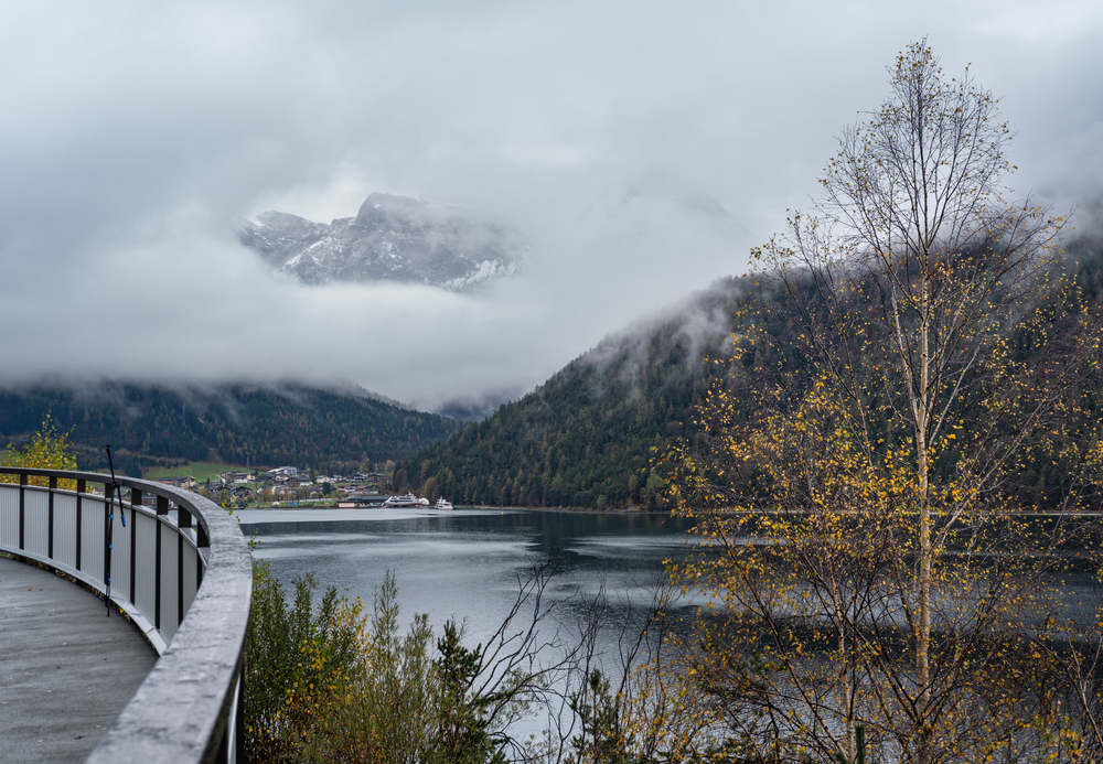 Mountain alpine autumn lake Achensee, Alps, Tirol, Austria. Picturesque traveling, seasonal and nature beauty concept scene.