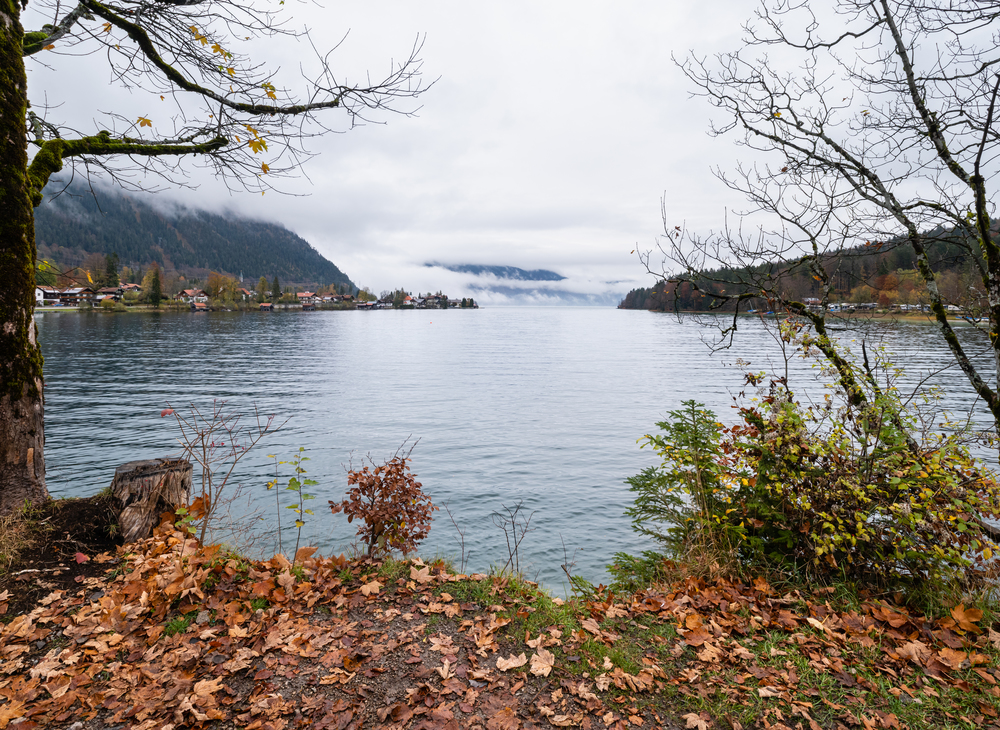 Mountain alpine autumn overcast evening lake Walchensee view, Kochel, Bavaria, Germany.  Picturesque traveling, seasonal and nature beauty concept scene.