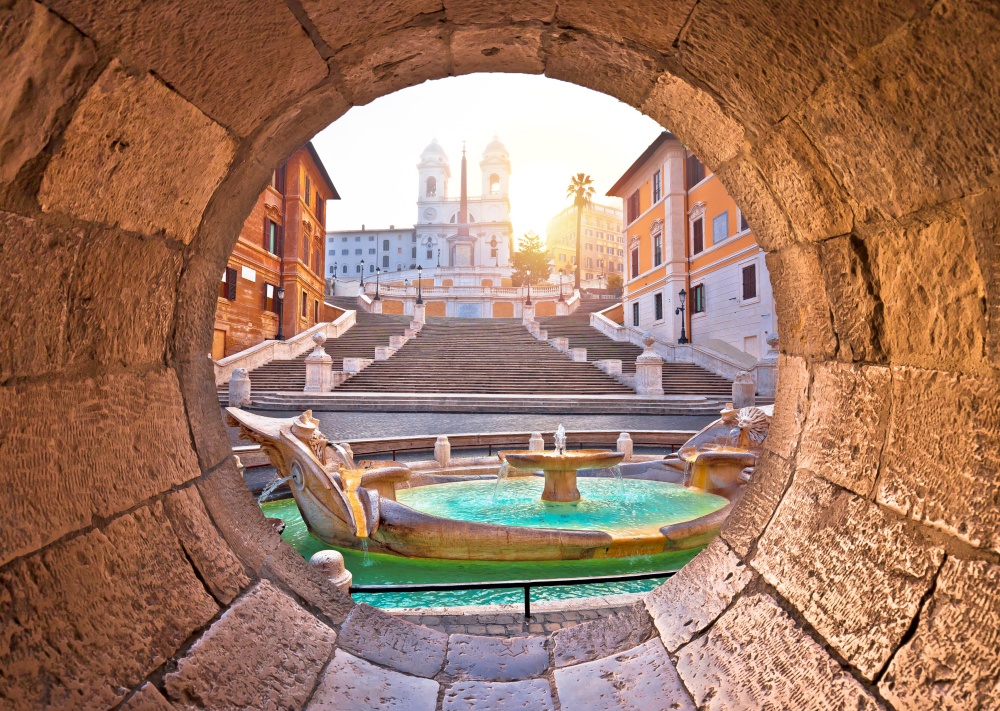 Spanish steps famous landmark of Rome morning view through stone window, capital of Italy
