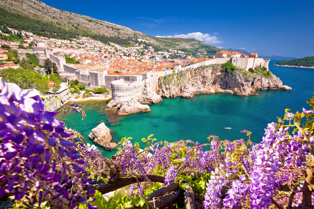 Medieval town of Dubrovnik with famous walls colorful view, UNESCO world heritage site in Dalmatia region of Croatia