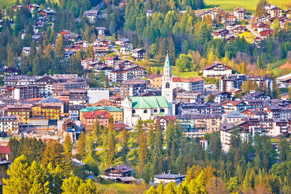 Town of Cortina d&rsquo; Ampezzo in green landscape of Dolomites Alps, Veneto region of Italy