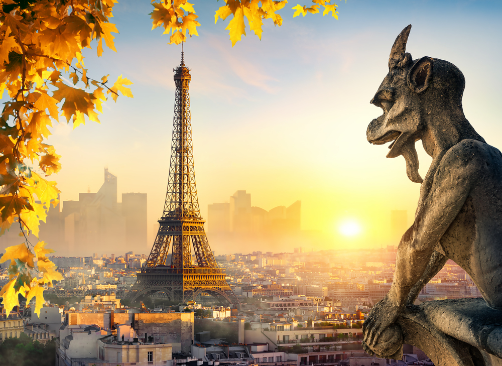 Stone Chimera and Eiffel Tower at sunset in Paris, France. Chimera in Paris