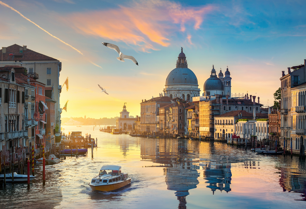 Beautiful calm sunset over Grand Canal in Venice, Italy. Grand Canal in Venice