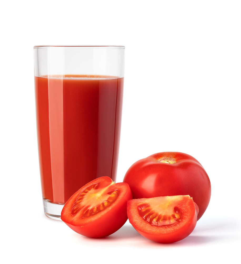 glass of tomato juice isolated on a white background. glass of tomato juice